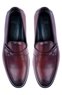 Bring polished style to your wardrobe with this smooth leather loafer featuring a cushioned footbed for superior comfort. Leather upper and lining/synthetic sole Imported Semi-formal Slip-on Moccasins With Removable Insole, Red Formal Moccasins With Branded Insole, Business Moccasins With Removable Insole, Classic Red Tassel Loafers For Business, Moc Toe Slip-ons For Galas, Formal Leather Moc Toe Shoes With Cushioned Footbed, Formal Cushioned Closed Toe Moccasins, Formal Moc Toe Leather Shoes With Cushioned Footbed, Formal Leather Shoes With Cushioned Footbed