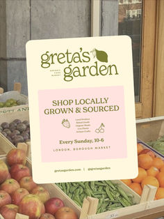 there is a sign that says great garden shop locally grown and sourced fruit