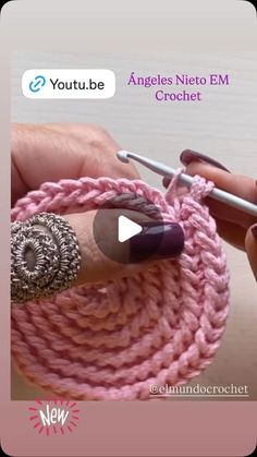 someone is crocheting an object with yarn