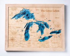 a wooden map of the great lakes