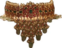 Intricate Design Choker For Reception And Festivals, Intricate Design Choker For Receptions And Festivals, Ceremonial Temple Jewelry With Jewels, Traditional Jeweled Kundan Necklace For Ceremonial Occasions, Ceremonial Temple Jewelry With Jeweled Details, Traditional Jeweled Necklaces For Wedding, Traditional Jeweled Necklaces For Rituals, Bollywood Style Ceremonial Jeweled Jewelry, Traditional Kundan Necklace With 17 Jewels For Reception