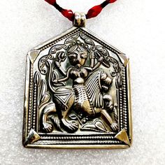 Handmade 92.5 Sterling Silver Mahavidhya  Goddess Riding a Lion Maa Durga Tribal Charm Ethnic Pendant Religious Necklace Locket Boho Pendant With Colour String. Made by Me and My Shop Members. Pendant Length With Loop 5.2cm. Pendant Width 4.1 cm.  Pendant Weight 8.gms.  Thickness Of Pendant is 1mm. Necklace Locket, Maa Durga, Boho Pendant, A Lion, Locket Necklace, Locket, Jewelry Necklace Pendant, Beauty Book, Jewelry Necklaces