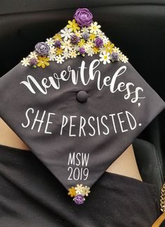 a graduation cap with flowers on it that says, never the mess she perished msw 2019