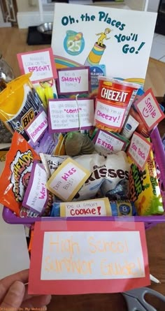 a purple basket filled with lots of candy