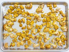 roasted cauliflower on a baking sheet ready to go into the oven