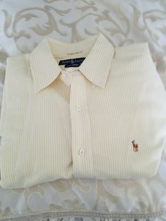 Great piece missing one button on shirt see pics yellow striped and has been dry cleaned it has name on back color inside full disclosure Fitted Polo Collar Shirt For Semi-formal Occasions, Fitted Polo Shirt With Buttons For Spring, Fitted Long Sleeve Polo Shirt With Buttons, Classic Polo Shirt With Buttons And Casual Collar, Classic Polo Shirt With Casual Collar, Fitted Button-up Polo Shirt, Spring Fitted Button-up Polo Shirt, Fitted Collared Preppy Polo Shirt, Preppy Fitted Collared Polo Shirt