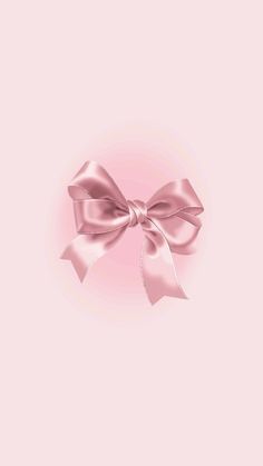 a pink background with a large bow on the top and bottom part of it's ribbon