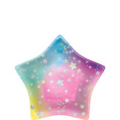 a pink and blue star shaped balloon with white stars on the bottom, against a white background