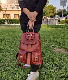 This small yet spacious leather backpack is the perfect partner for you whether going for a weekend trip, school, college or simply hanging out with your friends. It is designed to carry all your essentials on-the-go. This bag will go with everything! It is stylish, vintage-looking, and unique which makes it a must-have. Our Bag offers you two adjustable leather shoulder straps with leather handles at the top to carry in your suitable style. This Bag is handcrafted by talented artisans, popular Large Capacity Leather Satchel Backpack For Trips, Large Capacity Leather Backpack, School Backpack In Soft Leather, Soft Leather Backpack For School, Soft Leather School Backpack, Adventure Leather Satchel Backpack, Leather Satchel Backpack For Adventure, Leather Backpack For Trips, Soft Leather Backpack For Trip