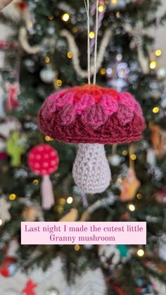 a crocheted mushroom ornament hanging from a christmas tree with the words last night i made the cutest little granny mushroom