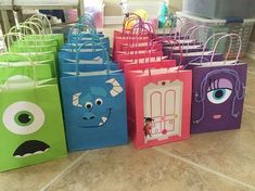 there are many bags that have different designs on them, including one with eyes and nose