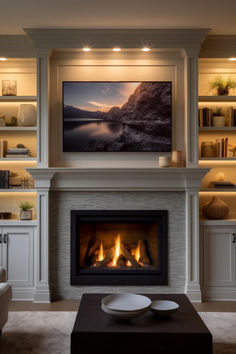 a living room with a fire place and built in bookshelves