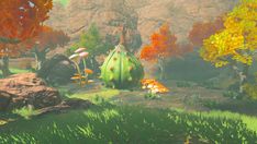 an animated image of some plants and mushrooms in the grass with mountains in the background