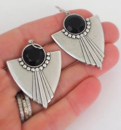 "Vintage Jewelry - Art Deco Earrings - Silver Earrings - Black Earrings - Statement earrings - Chloe's Vintage handmade jewelry Very cool silver plated Art Deco inspired earrings embellished with black faceted vintage glass stones. Chloe says, \"Wear them and feel fabulous!\" They measure 2 1/8\" long from the top of the sterling silver ear wires. Thanks for visiting Chloe's" Nickel-free Art Deco Dangle Earrings, Nickel-free Dangle Art Deco Earrings, Nickel-free Art Deco Metal Earrings, Nickel-free Dangle Earrings In Art Deco Style, Unique Black Pierced Earrings, Unique Black Dangle Plug Earrings, Art Deco Metal Drop Earrings, Unique Black Nickel-free Plug Earrings, Black Metal Clip-on Earrings For Gift