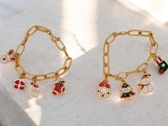 🎄✨ Celebrate the holidays in style with this Christmas-Themed Charm Bracelet! Made from durable steel with gold plating, it's adorned with enamel charms that bring festive cheer. Each bracelet is unique, with charming holiday-themed figures that may vary slightly, keeping the magic alive! 🎁 🔒 Material: Tarnish-resistant steel with gold plating 🔄 Adjustable Fit: Includes an extension for a perfect fit 💡 Care Tip: Avoid contact with perfume, detergents, or other chemicals to keep it shining bright! 🌟 Perfect for gifting or accessorizing your holiday outfits. Spread the joy of the season! 🎅✨ Holiday Jewelry, Enamel Charms, Charm Bracelets, Holiday Outfits, Gold Plating, Christmas Themes, Chemicals, The Magic, Jewelry Bracelets