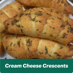 croissants on a plate with the words cream cheese crescents