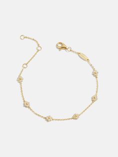 Never underestimate the power of subtle flowers. Embodying the sweetness of daisies, the Daisy 18K Gold Bracelet features an 18K gold plated sterling silver chain with interspersed Cubic Zirconia flower embellishments. It's even polished off with an adjustable extender, so you can ensure the perfect fit. Flower Gold Jewelry, Pandora Jewelry Gold, Gold Everyday Bracelet, Grad Jewelry Gold, Gold Daisy Necklace, Matching Bracelets For Sisters, Cute Jewelry Gold, Cute Flower Jewelry, Gold Jewelry Simple Bracelets