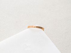 Our simple and dainty Solid Flat Band Ring can be layered with any of our stacking rings. Made with gold filled and sterling silver materials means they can be worn with minimal maintenance. This ring is also available with engraving and personalization, see other listings on our site.• Ring is about 2.5mm tall• Whole ring sizes in 4, 5, 6, 7, 8, 9These have been known to run on the small side, size up if between sizes. *if you are unsure of the ring size we have a printable PDF ring sizer, clic