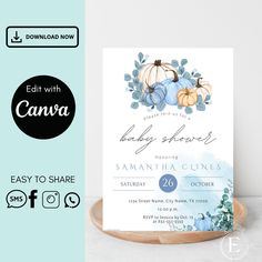 a baby shower with pumpkins and eucalyptus leaves on the front, and blue watercolor background