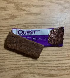 a chocolate bar sitting on top of a wooden table