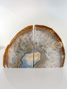 two pieces of agate stone sitting on top of each other