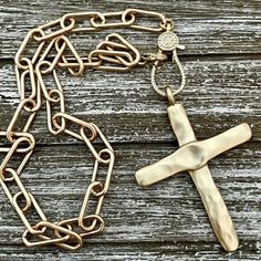 Cross Necklace A gorgeous matte gold, textured brass, cross pendant on a matte gold paperclip chain. The clasp is a micro pave carabiner. The approximate size brass chain link - 7mm x 17mm The approximate size of the cross pendant is -61mm x 43mm. the approximate size of the carabiner is 30mm x 25mm. The chain is Lead Safe and Nickel Safe, high-quality silver-plated Brass with several electroplating layers. A meaningful Christmas gift. Also available in matte silver. Listing in my shop. Elevate Meaningful Christmas Gifts, Gold Cross Necklace, Gold Cross, Gold Chain Necklace, Keep Jewelry, Brass Chain, Micro Pave, Matte Gold, Paper Clip