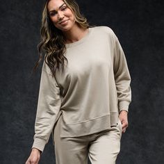 This insanely soft top is a core staple of the Essential Collection and is made from a dreamy modal fleece, which allows for moisture-wicking & next-level comfort. The midweight design and relaxed fit offer more freedom of movement, and when you’re this cozy, it’ll have you lounging all day. Relaxed Fit Athleisure Sweatshirt For Relaxation, Athleisure Relaxed Fit Sweatshirt For Relaxation, Oversized Comfy Top For Relaxation, Comfy Oversized Tops For Relaxation, Versatile Relaxed Fit Tops For Lounging, Versatile Cotton Sweatshirt For Loungewear, Relaxation Athleisure Activewear With Crew Neck, Relaxed Fit Tops With Soft Texture For Lounging, Relaxed Fit Tops For Lounging With Soft Texture