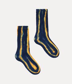 Our Ladies' socks in soft cotton feature an embroidered orb on the ankle, a motif created by Vivienne Westwood in the 1980s to symbolise taking tradition into the future. The design features our all-over striped artwork, which resembles our archival shirts. Striped Artwork, Ladies Socks, Into The Future, Socks And Tights, Knitwear Tops, The 1980s, Shirt Skirt, Corset Dress, Orange And Purple