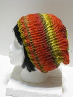 Beautiful hand knit unisex beanie in bright yellows, greens, reds and orange. 100% Acrylic. One size fits most. (Feels like cotton yarn.) Ready to ship. Frog Design, Types Of Gifts, Cotton Hand Towels, Skull Cap Beanie, Skull Cap, Towel Set, Beautiful Hand, Cotton Yarn, Hand Towels