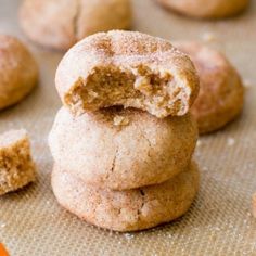 several cookies are stacked on top of each other with one bite missing from the cookie