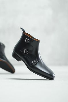 The Jagger is a bold triple monk strap ankle boot. A modern triple buckle closure is accompanied by a sleek, elongated plain toe design creating a perfect balance of elegance and simplicity. The leather sole features a rubber island for improved traction and durability.