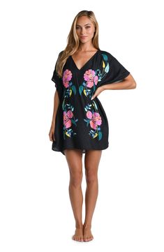 This cover-up features a bold floral print with large pink flowers accented by dark and light green leaves. The pattern is set against a black background, emphasizing the vibrant colors of the flowers and foliage. Styled with breezy dolman sleeves and a flowy fit, this cover-up is finished with gold and black enamel charms for a playful touch. [split] Details V-neck caftan Ties at neck Dolman sleeves Gold and black enamel charms Breezy silhouette Fabric 100% Rayon Crepe Swimsuit Material, Bold Floral Print, Pink And Blue Flowers, Dark And Light, Sun Tan, Enamel Charms, Black Enamel, Dolman Sleeve, Green Leaves