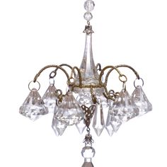 an antique chandelier with glass drops hanging from it