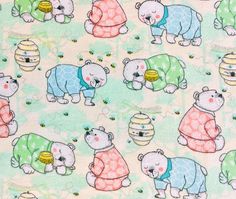 a close up of a pattern on a fabric with polar bears and honeycombs