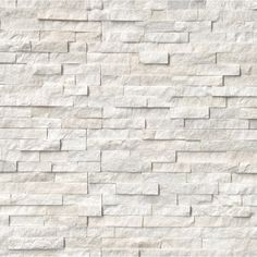 a white brick wall is shown in this image