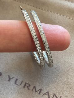 100% Authentic Previously Used Condition: very good Specifications David Yurman Diamond Hoop Earrings Estimated Retail $1775 Metal : High Polish 925 Sterling Silver Diamonds: Pave Setting round brilliant diamonds estimated .40-.45ct total Ornament: 38mm Width near 2.5mm Signature: Back of the Hoops Hallmark: 925 Post : 585 ( 14k Gold Post ) Collateral: Pouch Luxury Diamond White Hoop Earrings With Channel Set, Designer Platinum Jewelry In Diamond White, Designer Platinum Jewelry With Brilliant Cut, Silver Hoop Jewelry With Hand Set Details, Luxury Platinum Jewelry With Channel Set, Designer Jewelry With Diamond Accents For Everyday Luxury, Luxury Round Cut Hoop Earrings For Formal Occasions, Luxury Formal Round Cut Hoop Earrings, Luxury White Gold Hoop Earrings For Everyday