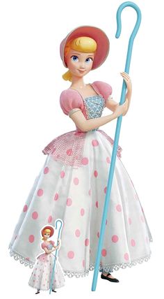 a barbie doll with a pink dress and hat holding a blue stick in her hand