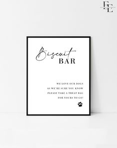 a black and white poster with the words biscuit bar on it, next to a dog's paw print