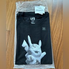 Brand New With Tags Uniqlo Crew Neck Top For Streetwear, Uniqlo Crew Neck T-shirt For Streetwear, Uniqlo Graphic Tee For Streetwear, Daniel Arsham, Uniqlo Shirt, Uniqlo Jeans, Snoopy T Shirt, Uniqlo Men, White Crewneck