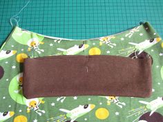 the fabric is being sewn together to make a skirt