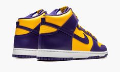 The Nike Dunk High “Lakers” is a colorway of the vintage basketball shoe that features the team uniform colors of the Los Angeles Lakers.  The two-tone, yellow-and-purple “Lakers” Dunk High was released ahead of the ‘22-23 NBA season in September 2022.  Sans official Lakers branding, the design nonetheless salutes the storied basketball team with its University Gold leather base with contrasting Court Purple leather overlays and Swoosh branding.  The “Nike” and Swoosh logos on the yellow nylon t Lakers Shoes, Sneakers Box, Branded Shoes For Men, Kobe Shoes, Vintage Basketball, Basic Hoodie, Dunks Nike, Nba Season, Nike Dunk High