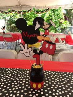 a mickey mouse centerpiece on top of a table