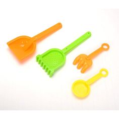 plastic utensils and shovels on a white background