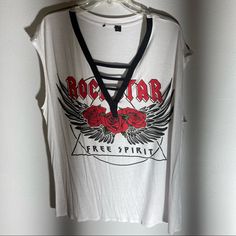 Rock It Out With This New Rock Star Free Spirit Sleeveless V T Top With Cross Cross. You Will Receive The White Item I Photographed Not The Similar One On Model. Rocker Style Tops For Spring Concerts, White Rock And Roll Tops For Summer, Rock And Roll Style Tops For Summer Music Festival, Edgy Tank Top For Spring Concert, White Rock And Roll Top For Summer, White Rock And Roll Summer Tops, White Rock And Roll Summer Top, Rebellious Spring Tops For Concerts, Chiffon Tunic Top