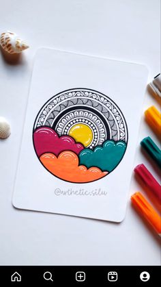 an image of a coloring book with markers and crayons on the table next to it