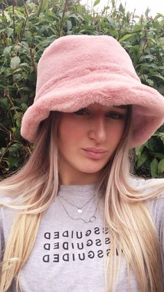 💥My hats are made by me and shipped to you WITHIN 3 days of receiving your order!Welcome to my fluffy shop where absolutely everything is made by me in England!  So because I make everything, any head size can be accommodated for, no worries at all! The standard size will fit heads approx 22- 23.5 inches, but if you want me to make a larger or smaller one, please add a measurement when ordering. Or message me your size.A very soft baby Pink Faux Fur Bucket hat. Hat fits heads approx 21.5 -23 inches but I can make one larger or smaller if you like. The added bonus with my hats is that the polar fleece lining is water resistant, so great if caught in a downpour! All handmade by me in Lancashire! Pink Bucket Hat Outfit, Pink Fur Hat, Pink Shoot, Rave Hats, Bucket Hat Outfit, Pink Bucket Hat, Fluffy Bucket Hat, Blue Bucket Hat, Fur Bucket