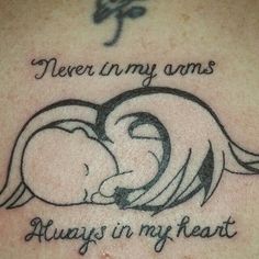 a tattoo with the words never in my arms and an image of a sleeping dog