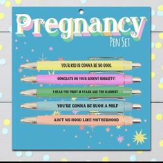 a set of four pens with the words,'pregnant pen set'on them