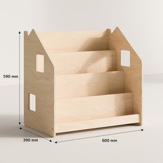 a wooden doll house with measurements for the size