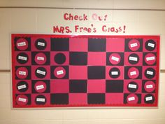 a check out board with black and red squares on it that says ms free's class